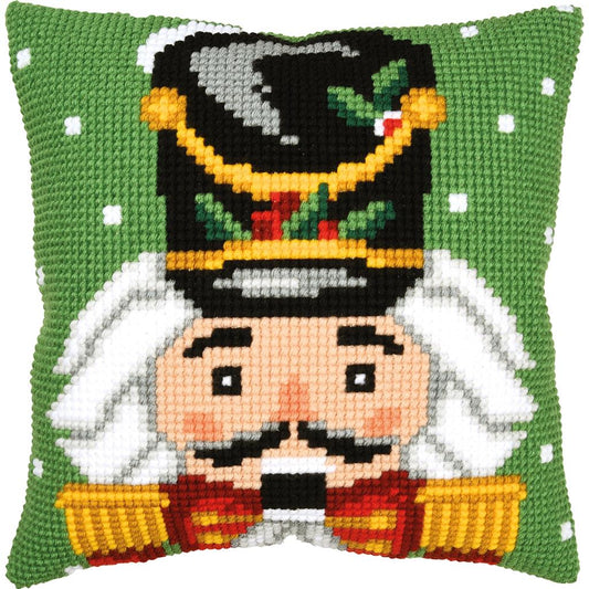 Vervaco DiY Kits featuring a festive green and white pattern with a central illustration of a nutcracker soldier wearing a black and gold hat.